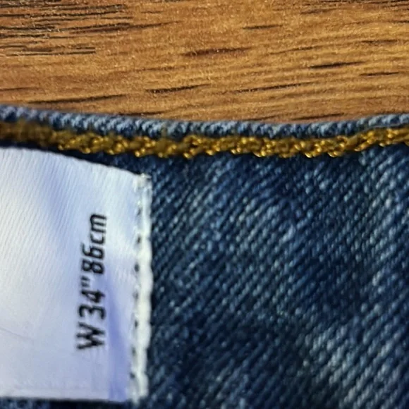 ASOS DESIGN mens skinny mid length denim shorts in mid wash blue size 34 - Picture 4 of 9